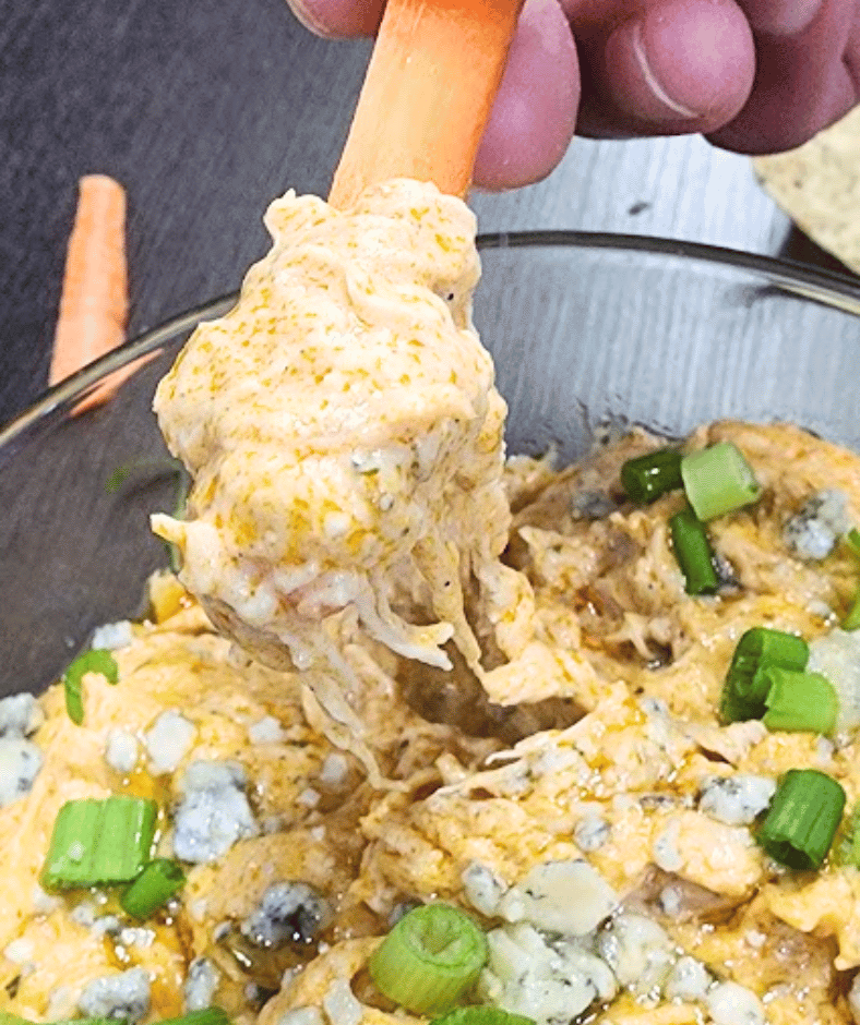 Eat Buffalo Chicken Dip with carrots for a healthy appetizer