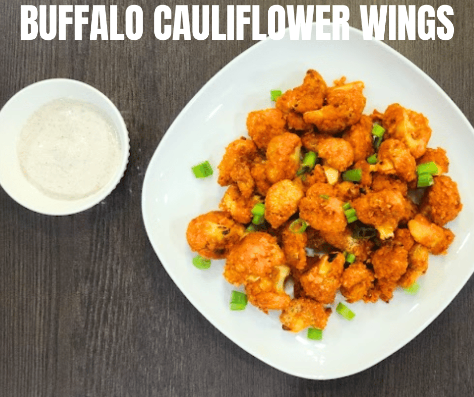 Crispy baked buffalo cauliflower straight from the oven, coated in a glossy sweet and spicy glaze.