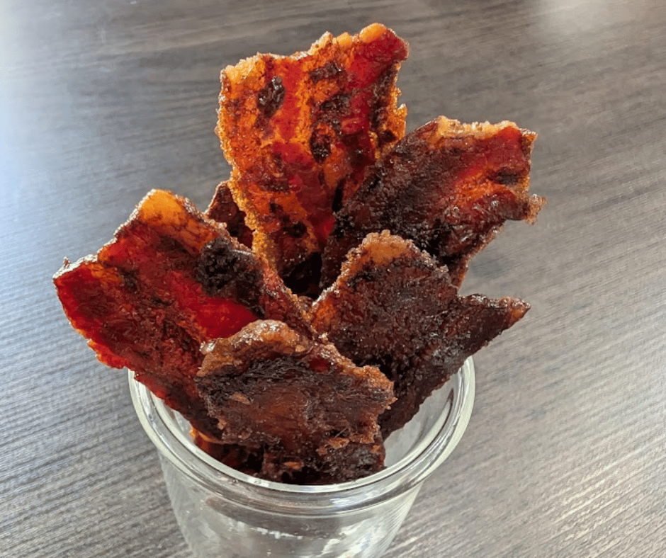 Sweet, smoky, and caramelized to perfection, this maple brown sugar candied bacon disappears straight off the tray.
