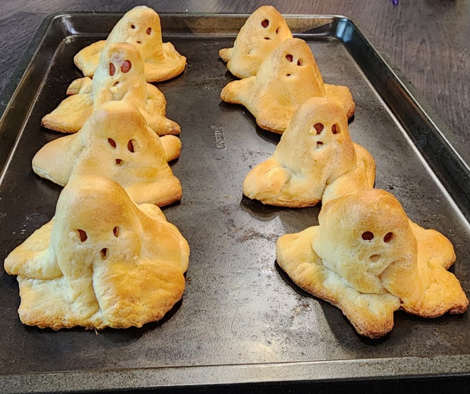 Step 6. Ghost Hot Dogs baked golden and ready to serve