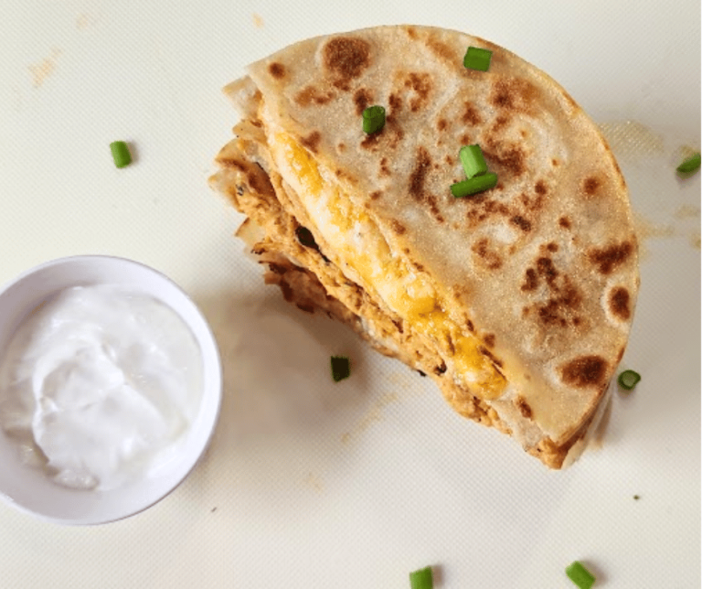 These buffalo chicken quesadillas dipped in sour cream are simply irresistible
