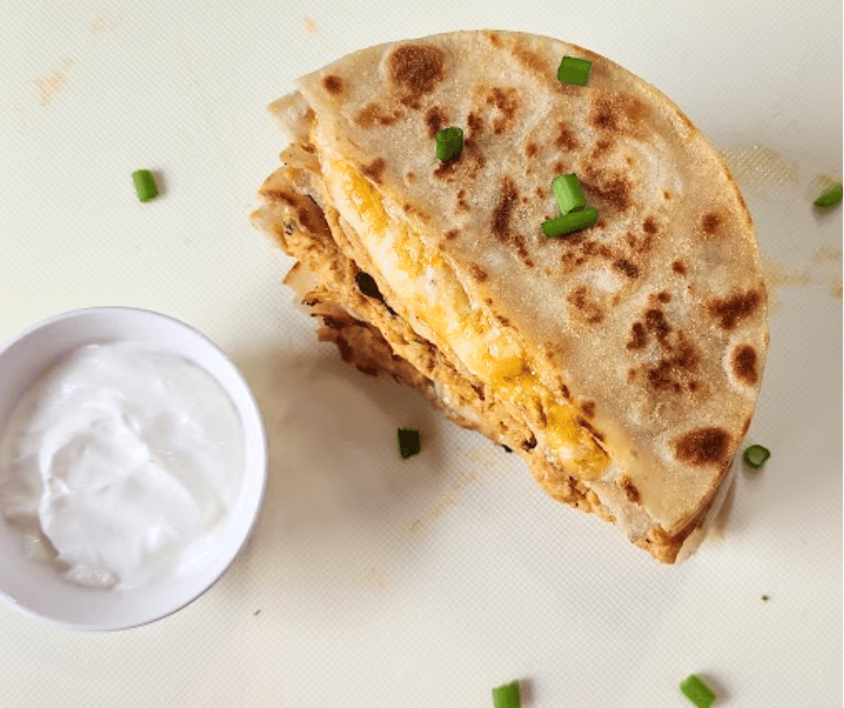 These buffalo chicken quesadillas dipped in sour cream are simply irresistible
