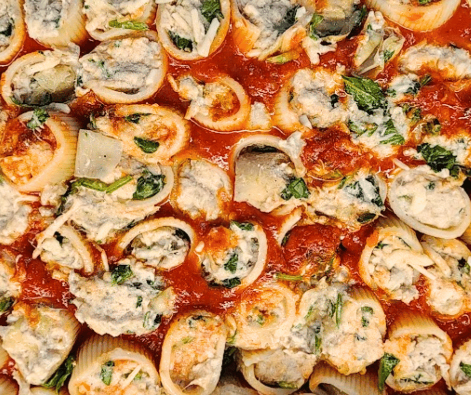 Spinach and ricotta stuffed Paccheri pasta before it goes in the oven to bake