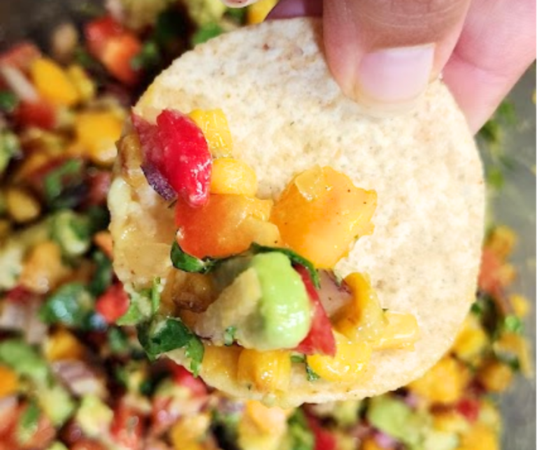 Mango avocado salsa that works just as well with chips as it does on grilled meat