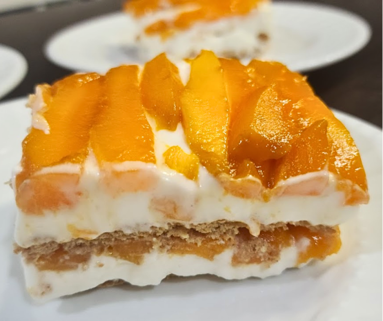 Sweet mango layered with soft graham is a simple no-bake dessert