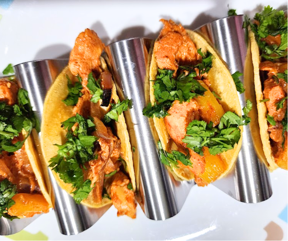 A final sprinkle of cilantro pulls these chciken al pastor tacos together