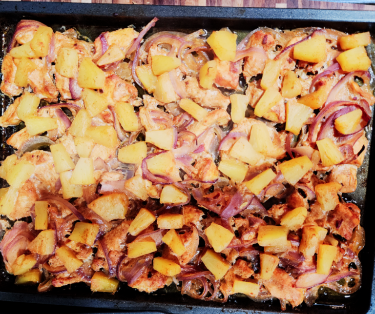 A full tray of Chicken Al Pastor that smells ready before it even comes out