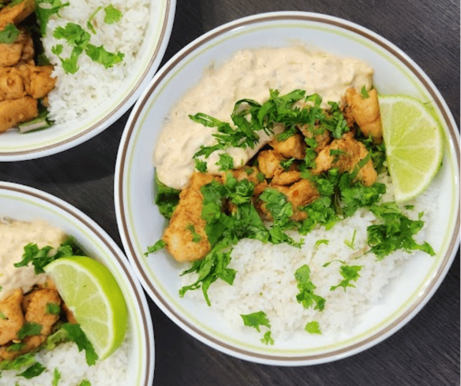 This bowl of creamy corn, spiced chicken, warm rice disappears faster than expected