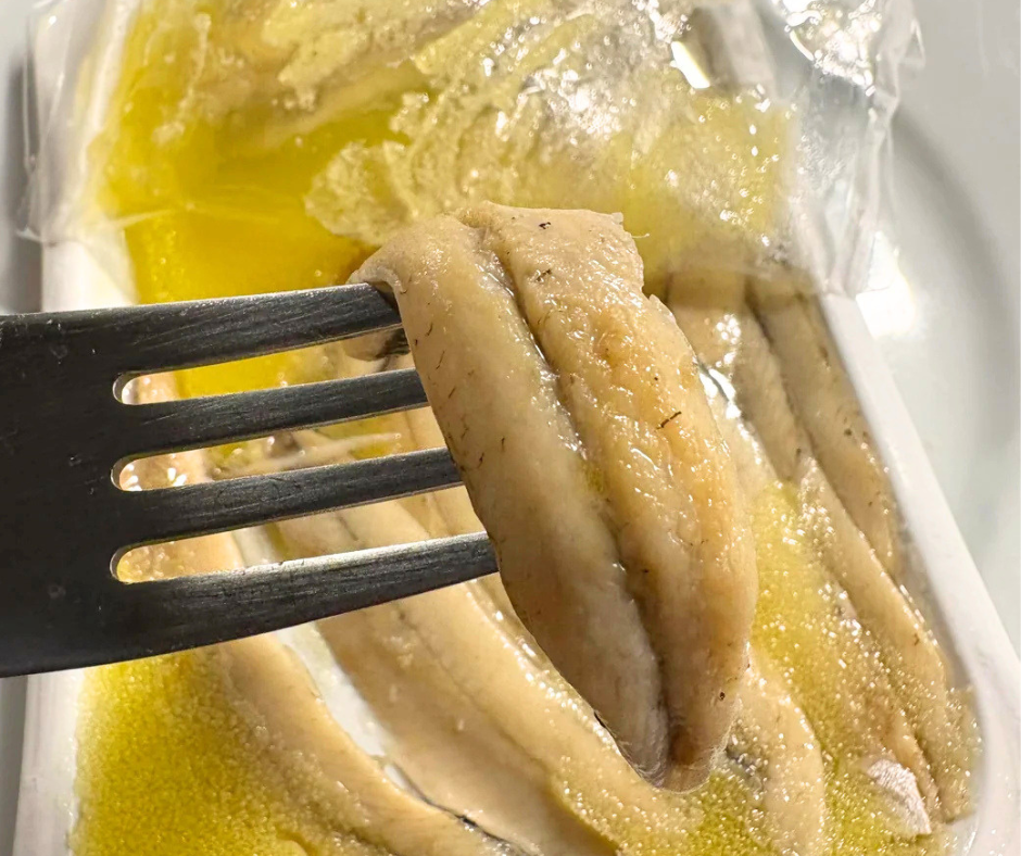 These marinated anchovies (boquerones) taste nothing like the salty flat anchovies