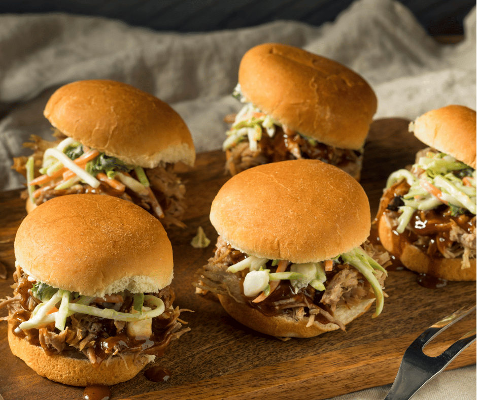 Slow cooked pulled pork sliders with all the fixins