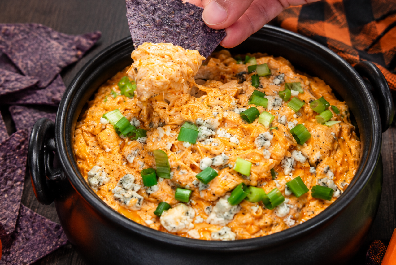 Buffalo Chicken Dip's orange color and cozy fall vibe is perfect for Halloween
